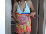My beautiful wife shows off in a bikini before going to the beach